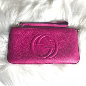 Gucci wristlet wallet.